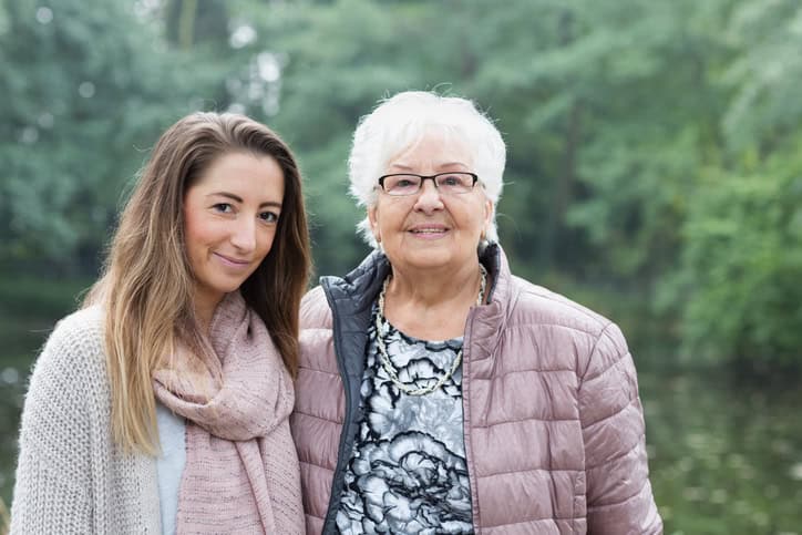 Portrait: Senior woman with adult granddaughter